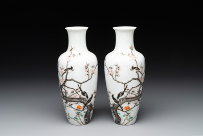 A pair of Chinese famille rose 'birds among flowering branches' vases, Ju Ren Tang 居仁堂製 mark, Republic