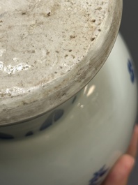 A Chinese blue and white pear-shaped vase with floral design, Transitional period