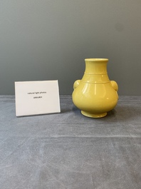 A Chinese yellow-glazed 'hu' vase, Qianlong mark, 19/20th C.