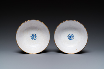 A pair of Chinese Canton enamel 'antiquities' bowls, Yongzheng/Qianlong