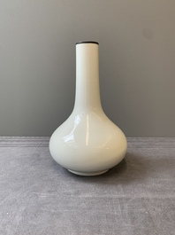 A Chinese white-glazed bottle vase, Gu Jin 古今 mark, 19th C.