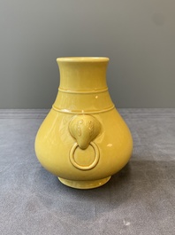 A Chinese yellow-glazed 'hu' vase, Qianlong mark, 19/20th C.