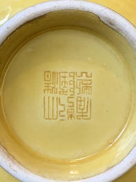A Chinese yellow-glazed 'hu' vase, Qianlong mark, 19/20th C.