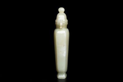 A Chinese white and russet jade lotus-form brush washer and two covered vases, Qing