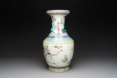 A Chinese famille rose 'magpies and plum blossoms' vase on wooden stand, 19th C.