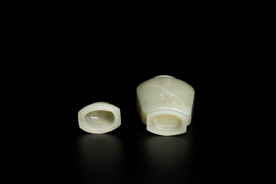A Chinese white and russet jade lotus-form brush washer and two covered vases, Qing