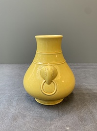 A Chinese yellow-glazed 'hu' vase, Qianlong mark, 19/20th C.