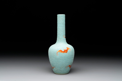 A Chinese iron-red-decorated turquoise-ground bottle vase with bats, Qianlong mark, 20th C.
