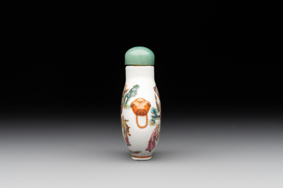 A Chinese famille rose '18 Luohan' snuff bottle, Daoguang mark and of the period