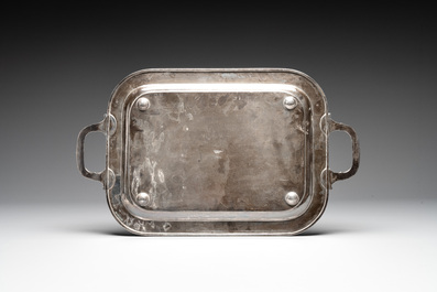 A sterling silver tray with two handles, Southeast Asia, 19/20th C.