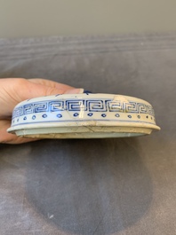 A Chinese blue and white two-handled container and cover with floral design, Kangxi
