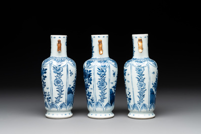 A Chinese blue and white garniture with five vases, Kangxi