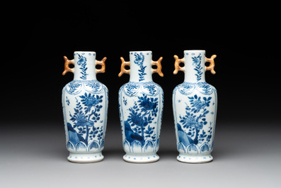 A Chinese blue and white garniture with five vases, Kangxi