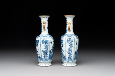 A Chinese blue and white garniture with five vases, Kangxi