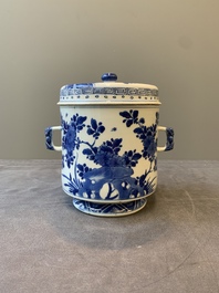 A Chinese blue and white two-handled container and cover with floral design, Kangxi