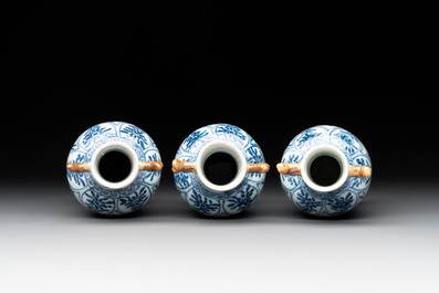 A Chinese blue and white garniture with five vases, Kangxi