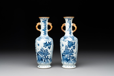 A Chinese blue and white garniture with five vases, Kangxi