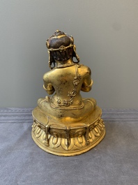 A Sino-Tibetan gilt bronze Virūpa, 19th C.