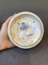 A Chinese blue and white two-handled container and cover with floral design, Kangxi