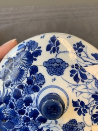 A Chinese blue and white two-handled container and cover with floral design, Kangxi