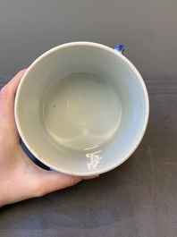 A Chinese blue and white two-handled container and cover with floral design, Kangxi