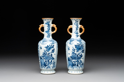 A Chinese blue and white garniture with five vases, Kangxi