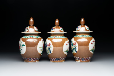 Three Chinese famille rose capucin-brown-ground vases and three covered sugar bowls, 18/19th C.