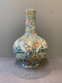 A fine Chinese famille rose 'millefleurs' bottle vase with immortals, Kangxi mark, Republic