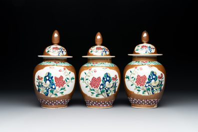 Three Chinese famille rose capucin-brown-ground vases and three covered sugar bowls, 18/19th C.