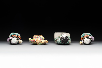A Chinese verte biscuit figure and three famille rose figures, 18/19th C.