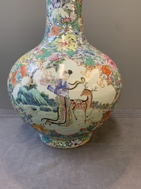 A fine Chinese famille rose 'millefleurs' bottle vase with immortals, Kangxi mark, Republic