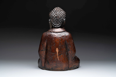 A gilt and lacquered wooden Buddha, Vietnam, 19th C.