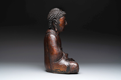 A gilt and lacquered wooden Buddha, Vietnam, 19th C.