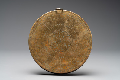 An Islamic brass astrolabe and a Persian sundial with compass, 19th C.