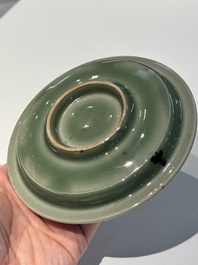 A Chinese Longquan celadon 'twin fish' plate, Yuan/Ming