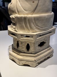 An extremely rare Chinese Swatow cream-glazed seated Buddha, Xuande mark, Ming