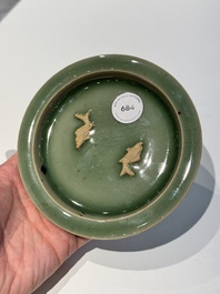 A Chinese Longquan celadon 'twin fish' plate, Yuan/Ming