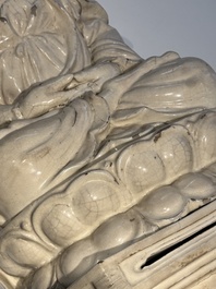 An extremely rare Chinese Swatow cream-glazed seated Buddha, Xuande mark, Ming
