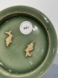 A Chinese Longquan celadon 'twin fish' plate, Yuan/Ming