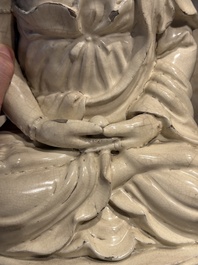 An extremely rare Chinese Swatow cream-glazed seated Buddha, Xuande mark, Ming
