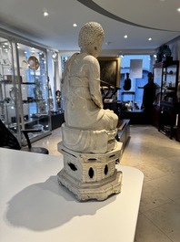 An extremely rare Chinese Swatow cream-glazed seated Buddha, Xuande mark, Ming