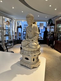 An extremely rare Chinese Swatow cream-glazed seated Buddha, Xuande mark, Ming