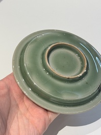 A Chinese Longquan celadon 'twin fish' plate, Yuan/Ming