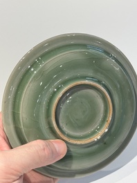 A Chinese Longquan celadon 'twin fish' plate, Yuan/Ming