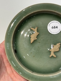 A Chinese Longquan celadon 'twin fish' plate, Yuan/Ming