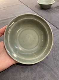 A Chinese Longquan celadon plate and two saucer dishes, Ming