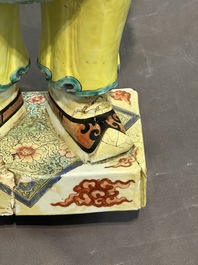 A pair of large Chinese famille rose figures on stands, Qianlong