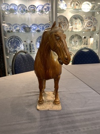 A Chinese sancai-glazed model of a horse, Tang