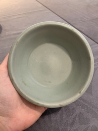 A Chinese Longquan celadon plate and two saucer dishes, Ming