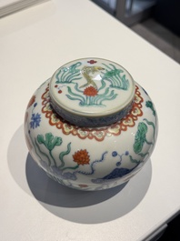 A Chinese doucai 'lotus pond with carps' jar and cover, tian 天 mark, 19/20th C.